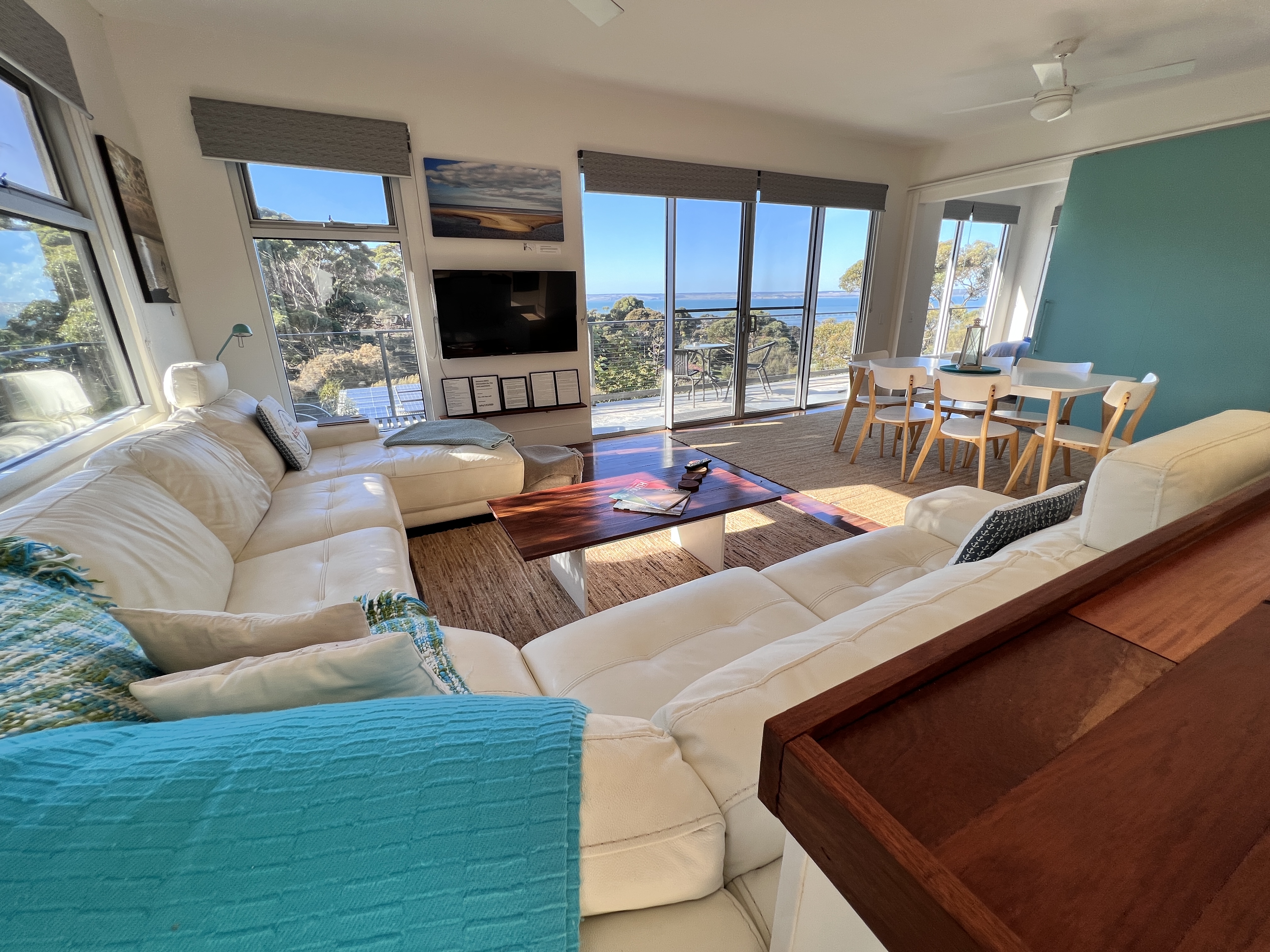 Open Plan Living and Dining Area - roll out onto outdoor balcony all one level